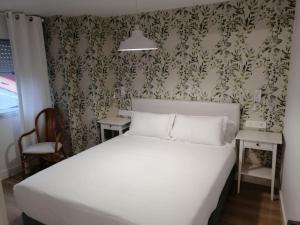 En eller flere senge i et værelse på Apartamento 1 hab (402) 140m Playa Caneliñas Máx 3 pax