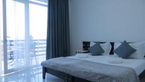 Voodi või voodid majutusasutuse Kolkhi Guest House toas