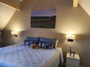 Postel nebo postele na pokoji v ubytování Maple Cottage B&B