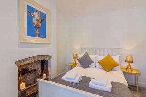 Ένα ή περισσότερα κρεβάτια σε δωμάτιο στο Newly Refurbished Traditional Cottage Blackrock