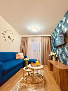 TV a/nebo společenská místnost v ubytování Downtown Apartments Sinatra air-conditioned
