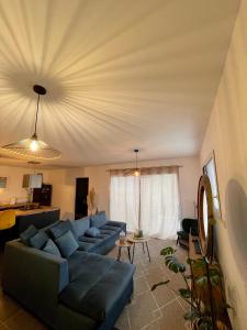 Μια τηλεόραση ή/και κέντρο ψυχαγωγίας στο Maison moderne cosy et lumineuse