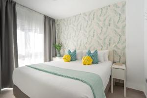 Posteľ alebo postele v izbe v ubytovaní Torremolinos Bajondillo Beach
