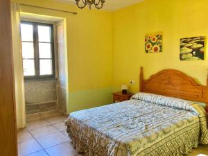 Posteľ alebo postele v izbe v ubytovaní Casa do Campo Louro