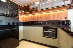 A cozinha ou cozinha compacta de Vita Boulevard 206-D - My Home Temporada