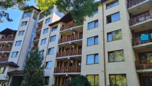 an image of an apartment building with balconies at Suite Roma 2 at Spa Club Bor in Velingrad
