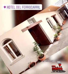 a model of a house with a door and potted plants at Hotel del Ferrocarril in Quetzaltenango