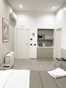 Kuchyňa alebo kuchynka v ubytovaní Room25mq