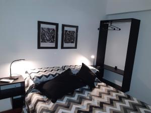 Een bed of bedden in een kamer bij Mi lugarcito