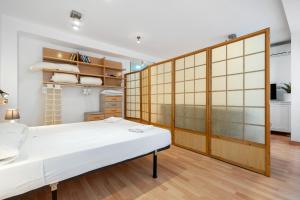 Postel nebo postele na pokoji v ubytování Hauzify I Apartament Torremar
