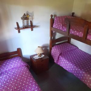 En eller flere senge i et værelse på Chalet Costavaleria + 36 billeder