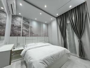 En eller flere senge i et værelse på BS Lodging 16- Next to Dream Beach