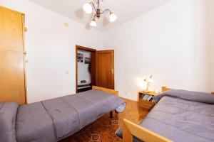 Postel nebo postele na pokoji v ubytování [Volterra] Relax Apartament W/ Beautiful View
