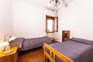 Postel nebo postele na pokoji v ubytování [Volterra] Relax Apartament W/ Beautiful View