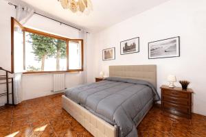 Postel nebo postele na pokoji v ubytování [Volterra] Relax Apartament W/ Beautiful View