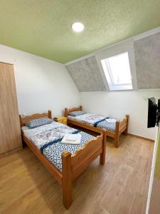 Postel nebo postele na pokoji v ubytování Gorštak