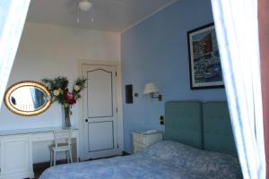 Postel nebo postele na pokoji v ubytování Hotel Hermitage