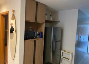 Kuchyň nebo kuchyňský kout v ubytování Itacimirim pé na areia 2Q