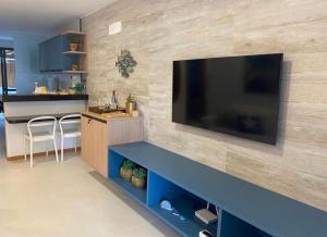 TV a/nebo společenská místnost v ubytování Itacimirim pé na areia 2Q