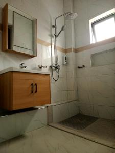 Ein Badezimmer in der Unterkunft Eliper Hotel