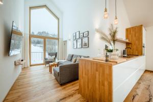 TV a/nebo společenská místnost v ubytování Da Alois - Alpine Premium Apartments