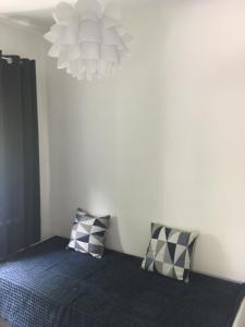 Posteľ alebo postele v izbe v ubytovaní SZINYEI APARTMAN