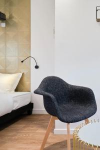 Fotografia z galérie ubytovania NG SuiteHome - Lille I Roubaix Gare I Lorraine - Maison 2 chambres - Balnéo - Netflix - Wifi - Jardin v destinácii Roubaix + 22 fotografií