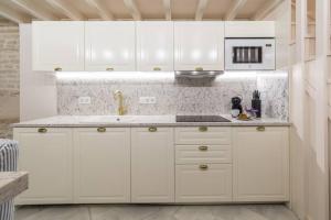 Kuchyň nebo kuchyňský kout v ubytování Judería de Sevilla II - Luxury Apartments