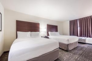 Katil atau katil-katil dalam bilik di Cobblestone Hotel & Suites - Seward