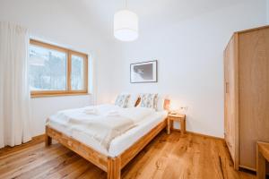 Voodi või voodid majutusasutuse Da Alois - Alpine Premium Apartments toas