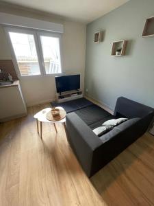Χώρος καθιστικού στο Le Cocon - Duplex Moderne & Cosy au Cœur de Douai +3 φωτογραφίες