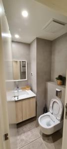 a bathroom with a toilet and a sink at Premium Studio Apartment - Belgrade Waterfront in Sajmište +38 photos