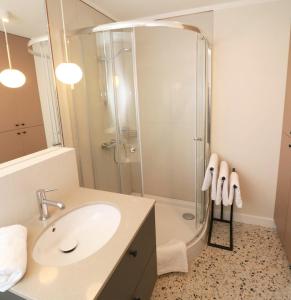 Kúpeľňa v ubytovaní Falcon Apartment Center 1 Warszawa Centralna