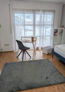Postel nebo postele na pokoji v ubytování FeWo Goldstück mit privatem SPA und Whirlpool