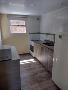 Η κουζίνα ή μικρή κουζίνα στο Cabaña La Encontrada +6 φωτογραφίες