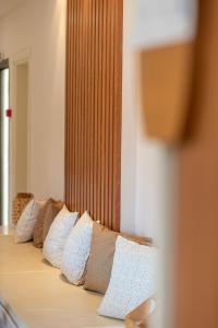 A bed or beds in a room at Hotel Areti