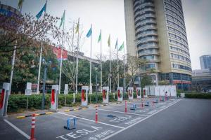 a parking lot with a row of red and white barriers at Yiwu Ocean Hotel - Original Best Western Premier Ocean Hotel in Yiwu