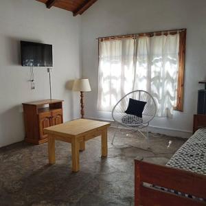 TV a/nebo společenská místnost v ubytování Los Piros Alojamiento