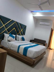 Letto o letti in una camera di Hotel Neptune Palace