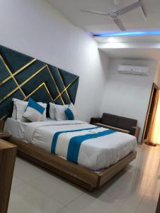 Letto o letti in una camera di Hotel Neptune Palace
