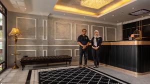 Členové personálu v ubytování SPRINGHILL RESORT