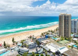 an aerial view of a beach and buildings and the ocean at Spectacular 19th Floor Apartment in Heart of Surfers Paradise in Gold Coast