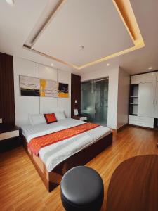 Postel nebo postele na pokoji v ubytování DT Hotel Hai Phong