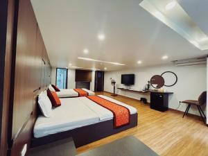 Postel nebo postele na pokoji v ubytování DT Hotel Hai Phong