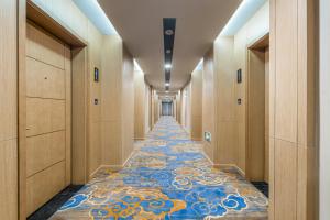 Foto sihtkohas Jiaozhou asuva majutusasutuse Joy Fall Hotel galeriist