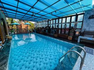 Bazén v ubytování Plaiphu Pool Villas nebo v jeho okolí