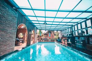 Bazén v ubytování Plaiphu Pool Villas nebo v jeho okolí