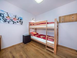 Postel nebo postele na pokoji v ubytování Apartment in Neukirchen by Wildkogelbahn