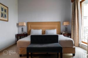Ένα ή περισσότερα κρεβάτια σε δωμάτιο στο Guest House Hotel Amman by FHM +37 φωτογραφίες