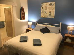 Laurelview Scenic Inn Gympie客房内的一张或多张床位